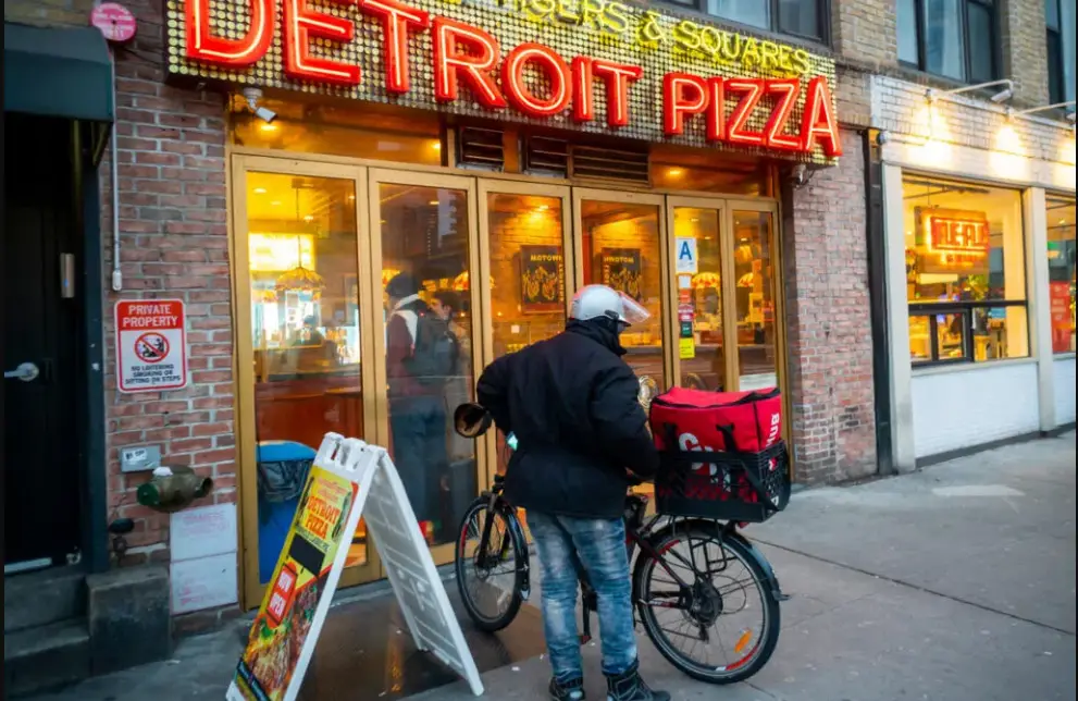 New York City sets historic minimum wage for food delivery employees